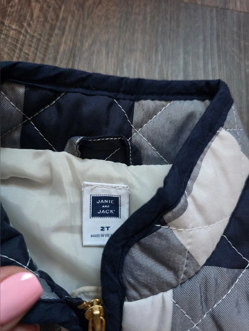 Janie & Jack navy and white buffalo plaid quilted peplum vest